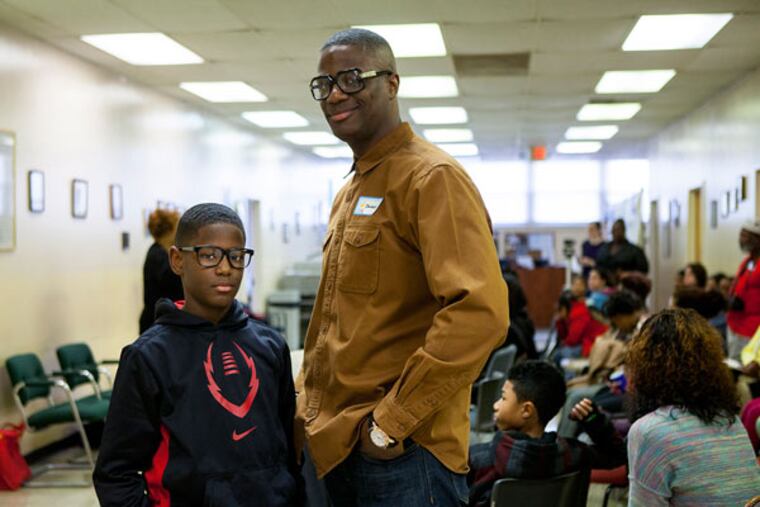 Dawan Williams got involved in FACT at a key moment in son Dawan Jr.’s life. Now out of prison, he runs sessions on the outside. (CHRIS FASCENELLI / Staff Photographer)