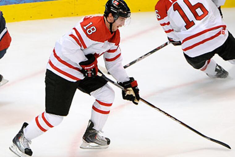 Mike Richards won't have much time to settle after helping Canada win gold in Vancouver. (Clem Murray/Staff Photographer)