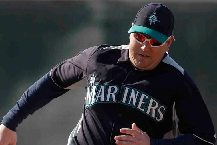 Take it slow, big guy. The way he hits, Seattle slugger Jack Cust doesn't have to practice beating the throw to first very much.