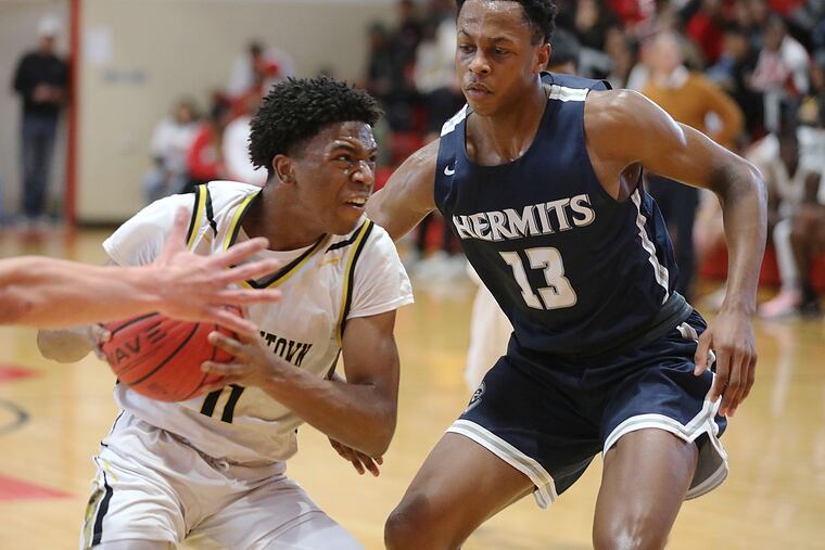 Bordentown's Jordan Martin (left) looks to get past St.Augustine's Elmarko Jackson in a recent game.