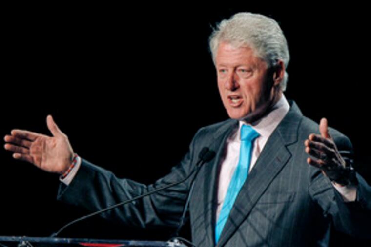 Former President Bill Clinton speaks at the Convention Center during an annual Advertising Specialty Institute trade show.