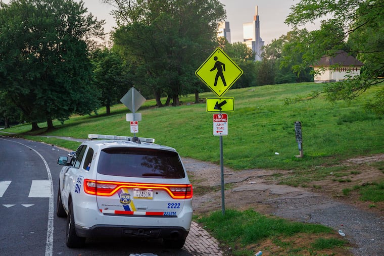 Philadelphia police are parked on the scene of a fatal shooting with multiple victims early Tuesday morning. The shooting took place late Monday night in the Lemon Hill area of Fairmount Park.