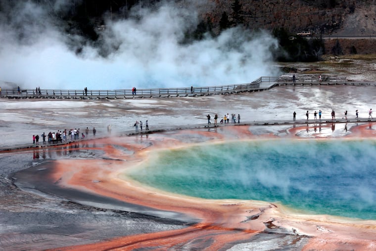 Crowds of visitors on the wooden walkways at the Midway Geyser Basin in Yellowstone National Park in 2015.