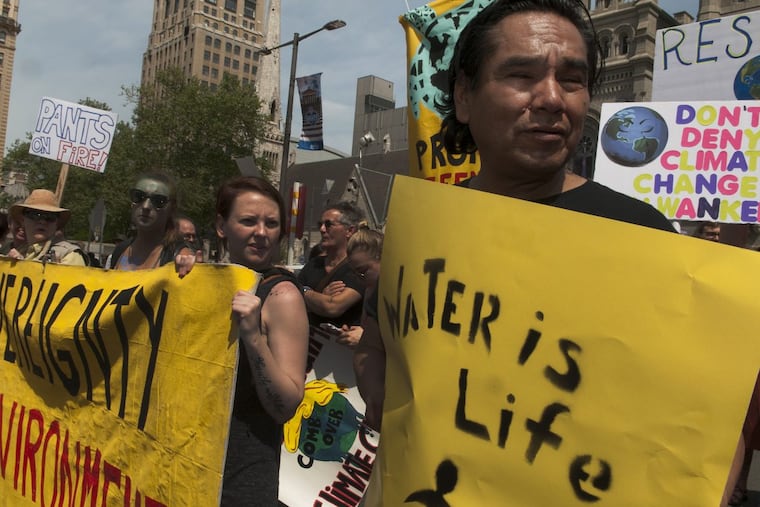 Loren Bagola from Cheyenne River South Dakato marching at the activists rally at Philadelphia City Hall to protest the Trump administration’s environmental policies on April 29, 2017.
