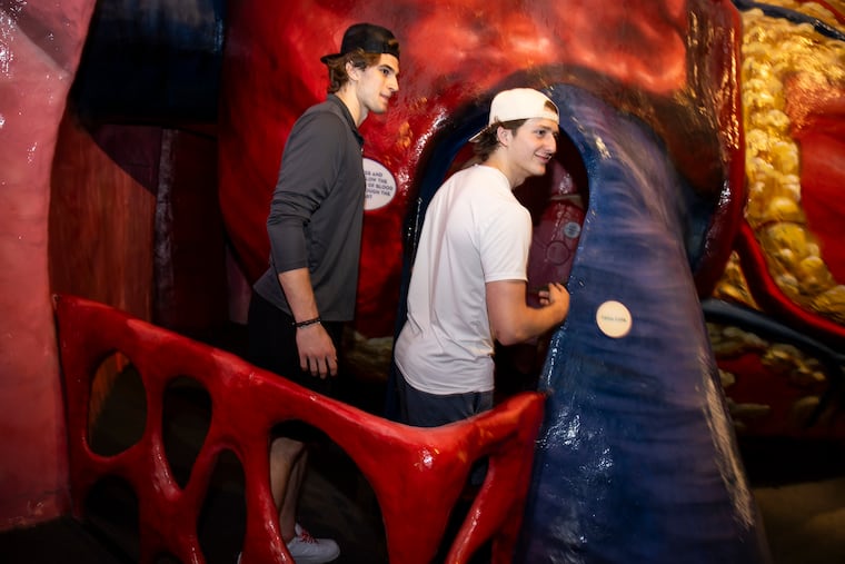 Flyers prospects Maksim Sokolovskii (left) and Brek Liske took a break from Flyers development to tour the Franklin Institute and meet some fans.