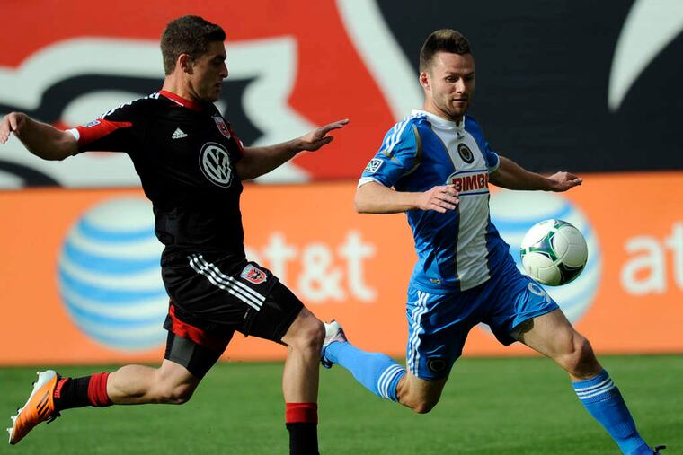 ASSOCIATED PRESS Union forward Jack McInerney (right) chases the ball against D.C. United defender Chris Korb in the first half at RFK Stadium.