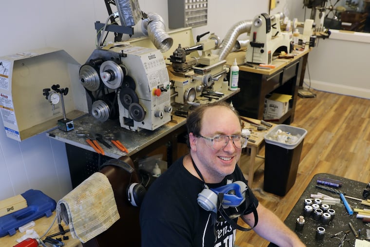 John Greco creating pens in his workshop/gallery at GW Pens in Woodstown, Salem County.