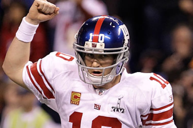 Eli Manning led the New York Giants on a game-winning drive in the final two minutes of the Super Bowl. (Eric Gay/AP)