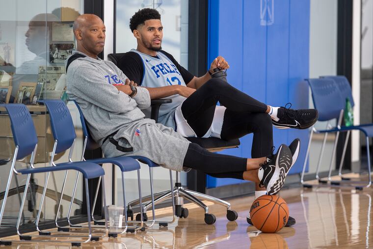 Sam Cassell (left), pictured with Tobias Harris, has been a Sixers assistant coach for three seasons.