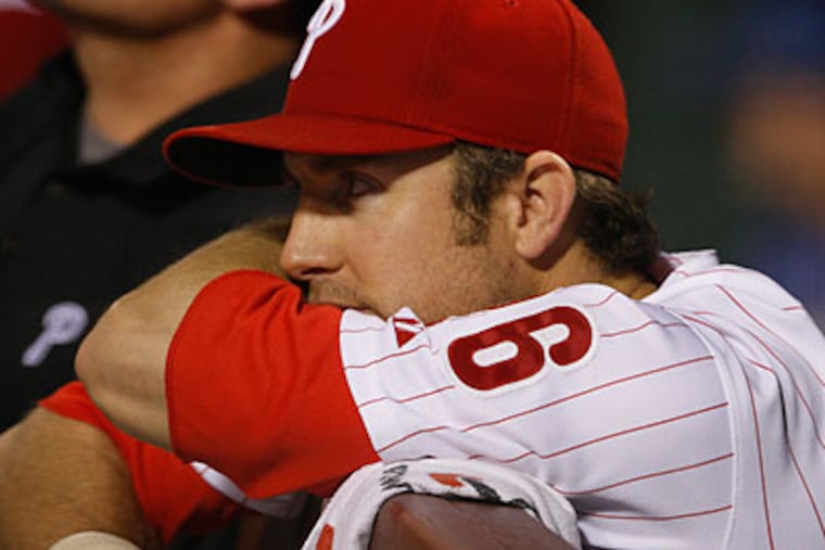 Chase Utley could only watch from the dugout as the Phillies fell to the Braves. (Ron Cortes/Staff Photographer)