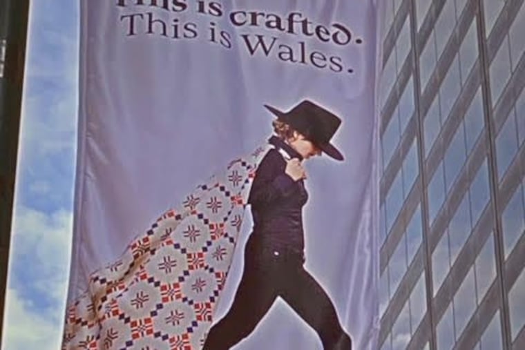 One of the banners for the North American Festival of Wales now hanging in Center City.