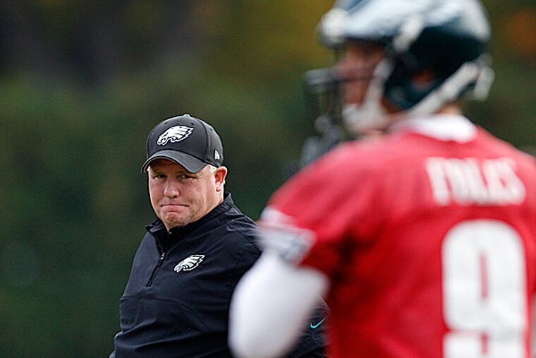 Eagles head coach Chip Kelly and quarterback Nick Foles. (David Maialetti/Staff Photographer)