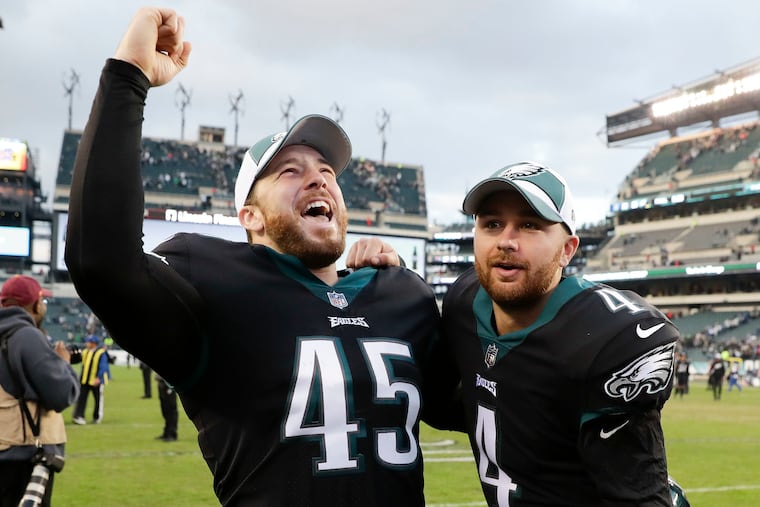 Eagles kicker Jake Elliott and long snapper Rick Lovato celebrates their win over the New York Giants on Sunday, November 25, 2018 in Philadelphia. Elliott kicked the game winning 43-yard field goal. YONG KIM / Staff Photographer