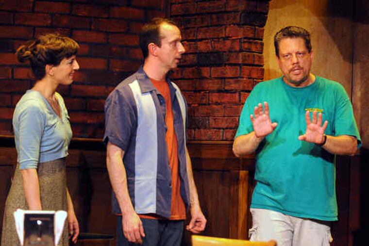 Kevin Glaccum, right, of Azuka Theatre, directs Leah Walton, left, and Charlie DelMarcelle in Adam Szymkowicz's comedy 'Nerve.' The playwright says, "it's funny, and there is a puppet."