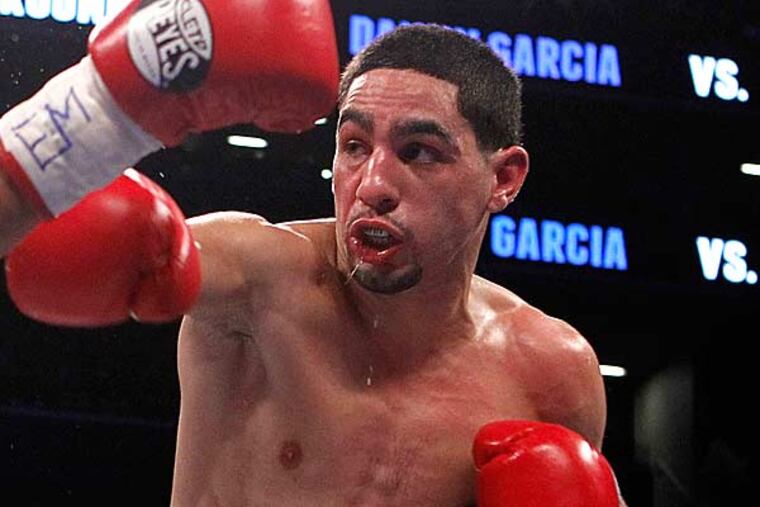 Danny Garcia hurt his ribs during training. (Jason DeCrow/AP file)