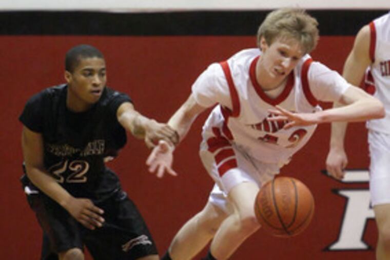 Pleasantville's Keith Gerald fouls Cinnaminson's Mark Tumas after Tumas stole the ball and was heading upcourt.