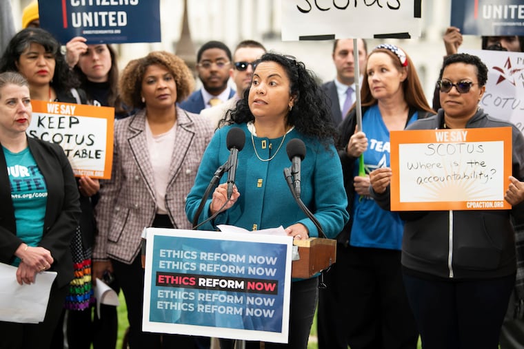 Analilia Mejia, center, speaks during a rally calling for SCOTUS ethics reform, May 2, 2023, in Washington. Mejia is running to succeed New Jersey Gov. Mikie Sherrill in Congress.