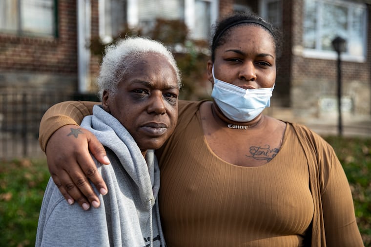 Kimberly Young-El, 53, and Tamra Young-El, her daughter, in West Oak Lane. They are grieving the loss of Young-El's daughter, Dominique Young-El, 33, and Dominique's son Auntione Terry, 7, who were killed when struck by a car Wednesday.