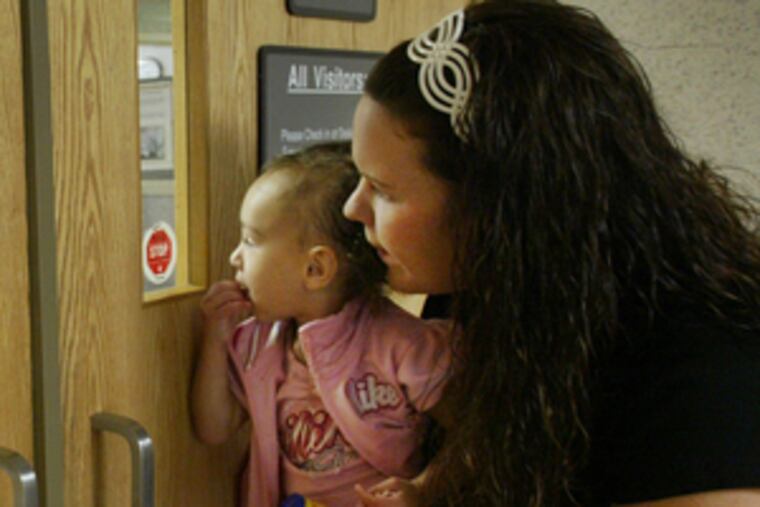 Bright-eyed and curious, Kiera Mary Denofa peers into the neonatal intensive-care unit at St. Christopher's where she had been a 2-pound patient. "She's so fine," says her mother, Stephanie.