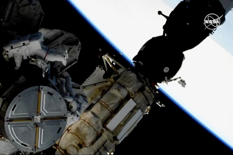 This image provided by NASA shows astronauts Anne McClain and Nick Hague taking a spacewalk to replace aging batteries on the International Space Station on Friday, March 22, 2019. Friday’s spacewalk is the first of three planned excursions to replace batteries and perform other maintenance.
