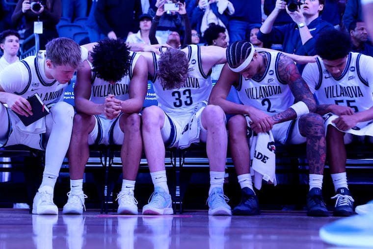 The Villanova Wildcats pray together before a game against the Providence Friars earlier this year.