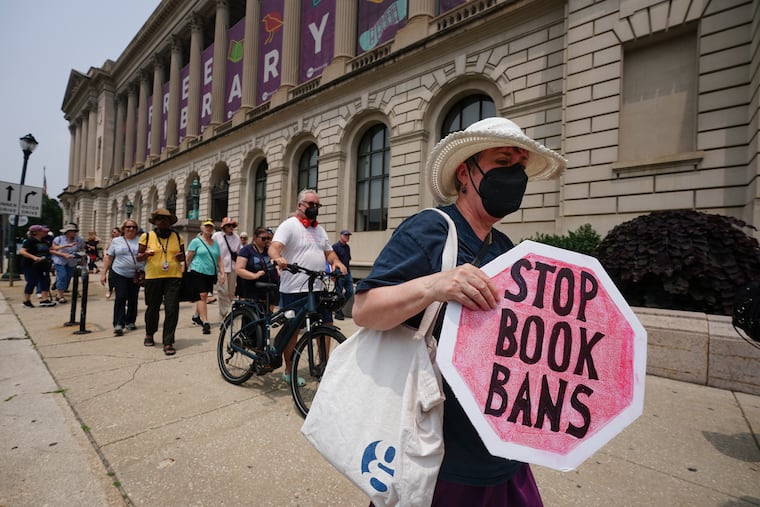 A group of protesters marched from the Parkway Central Library to 12th and Market Streets. The protesters were against the banning of books among other educational issues, during the Moms for Liberty convention in Center City, Philadelphia, Friday, June 30, 2023.