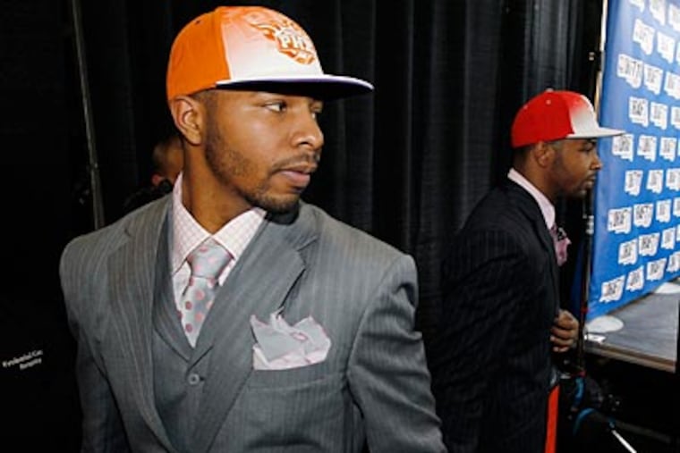 Markieff, left, and Marcus Morris were selected on back-to-back picks at the NBA Draft. (Julio Cortez/AP)