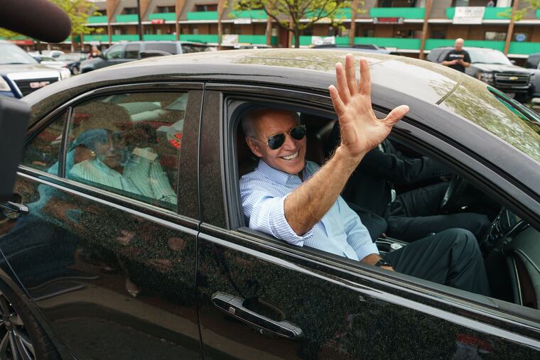 Joe Biden waves goodbye after stopping in at Gianni's Pizza & Grill, in Wilmington Delaware, April 25, 2019.
