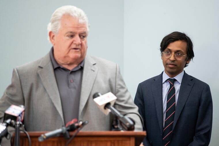 State Sen. Nikil Saval listens as Bob Brady, chairman of the Philadelphia Democratic Party, speaks during a news conference to denounce the Republican candidates for Senate and show support for Democratic nominee John Fetterman.