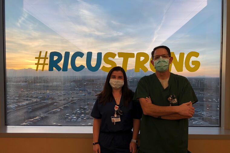 New York intensive care nurse Darya Haurylava (left) with respiratory therapist Fred Ashton when she volunteered to help with Utah's coronavirus surge at Intermountain Medical Center's respiratory intensive care unit in Murray, Utah.