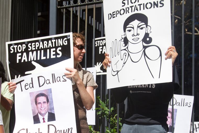 Protesters rally outside the Philadelphia office of Pennsylvania Human Services Sec. Ted Dallas on Sept.. 14, 2015, to deliver a report alleging human rights abuses at the Berks County Residential Center.