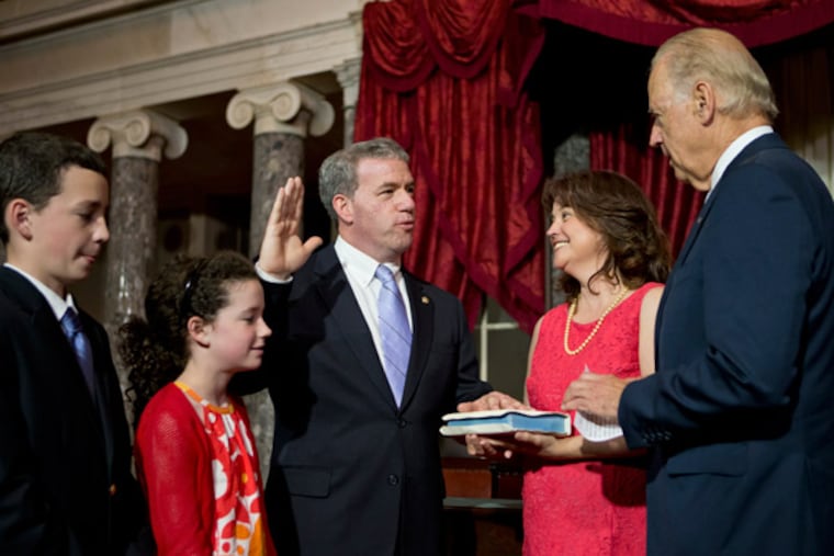 Jeffrey Chiesa, the interim-senator from New Jersey stands with Vice President Joe Biden for a ceremonial swearing-in photo in the Old Senate Chamber at the Capitol in Washington, Monday, June 10, 2013, joined by his wife Jenny Chiesa, their daughter Hannah and son Al. The official oath of office was performed earlier on the Senate floor. New Jersey Governor Chris Christie designated Chiesa, the state's attorney general and a fellow Republican, to fill the seat left by the death of Sen. Frank Lautenberg, D-N.J. Chiesa will serve for only a few months, until a new senator can be chosen by New Jersey voters in a special election in October. (AP Photo/J. Scott Applewhite)
