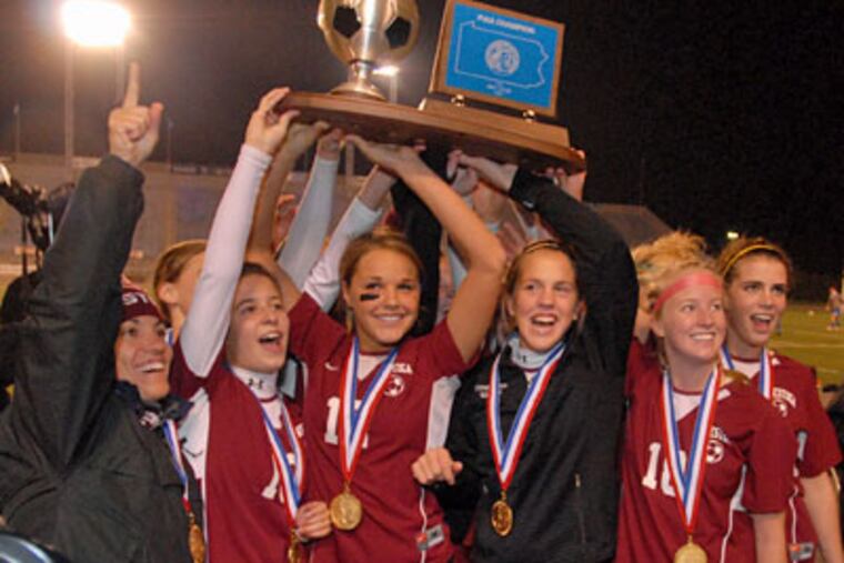 Conestoga celebrates its District 1 AAA championship in November 2007. (Bob Williams / For the Inquirer)