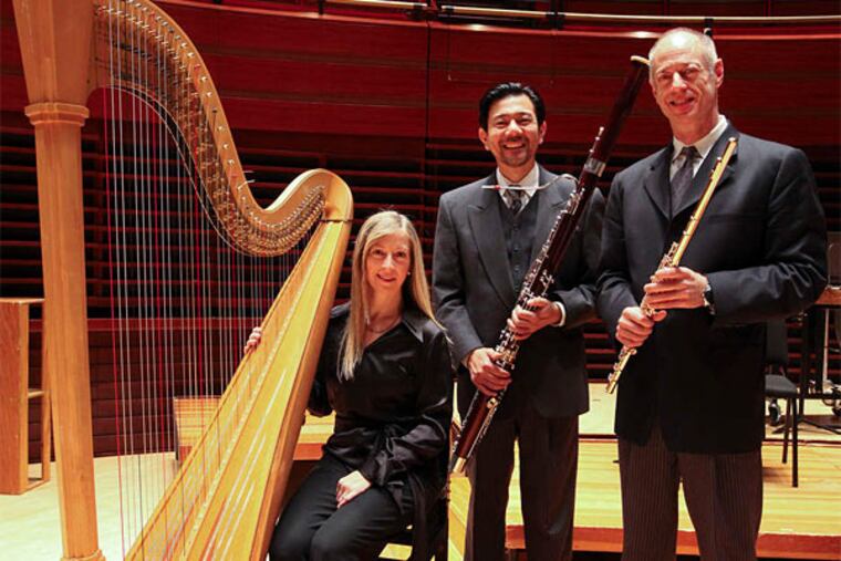 Harpist Elizabeth Hainen, bassoonist Daniel Matsukawa and flutist Jeffrey Khaner will play pieces written for their unique talents. (Steven M. Falk/Staff Photographer)