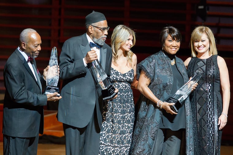 Three of the city's musical greats, the songwriters and producers Leon Huff (left) and Kenny Gamble and the singer Patti LaBelle, received the Marian Anderson Award, given annually, Tuesday night in a gala at the Kimmel Center. With them were MC Monica Malpass (right) and Nina Tinari-Schulson, award chairwoman.