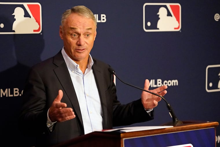 MLB commissioner Rob Manfred makes comments during a news conference at MLB baseball owners meetings, Thursday, Feb. 10, 2022, in Orlando, Fla.