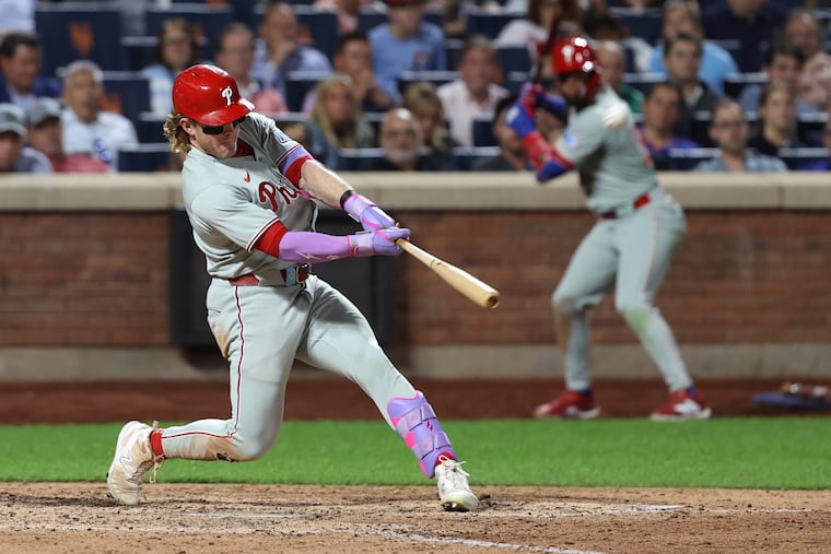 Harrison Bader hits a two-run home run leading Nick Castellanos to score during the eighth inning against the New York Mets on Aug. 26.