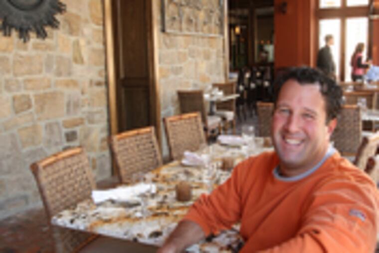 Kevin Clib, owner of Bridgets 8 West, in the addition to the dining area that was just finished at the Ambler restaurant.