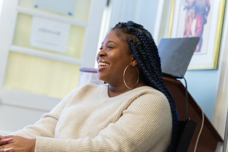 Shakira King at the Paul Robeson House & Museum meeting with other members of Noname's Book Club.