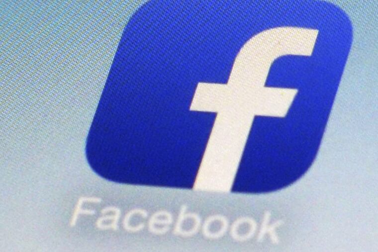 A Facebook app icon on a smartphone in New York.