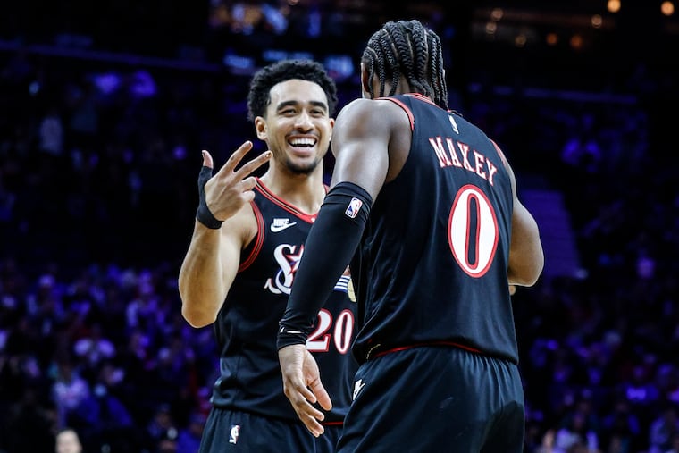 Sixers Jared McCain, here pictured with Tyrese Maxey, finished with 15 points, six assists, and two rebounds while playing in the first half for the Delaware Blue Coats vs. the Greensboro Swarm at Chase Fieldhouse.