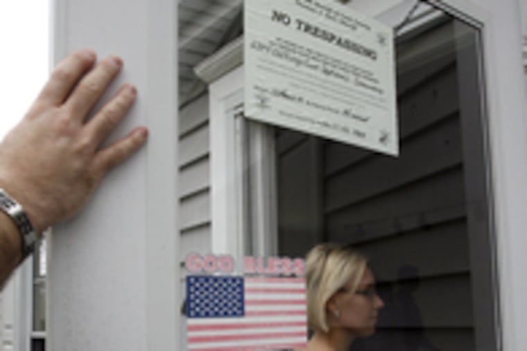 Dorothy Piotrowski enters a condo in her town, Schaumburg, Ill., on the foreclosure tour. "It would be my first investment. It's a great time to buy."