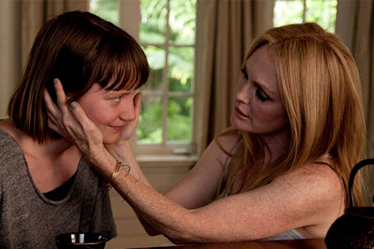 Mia Wasikowska (left) is a stranger who fixes herself to Julianne Moore, an actress trying to re-spark her career, in "Maps to the Stars." (Focus World)