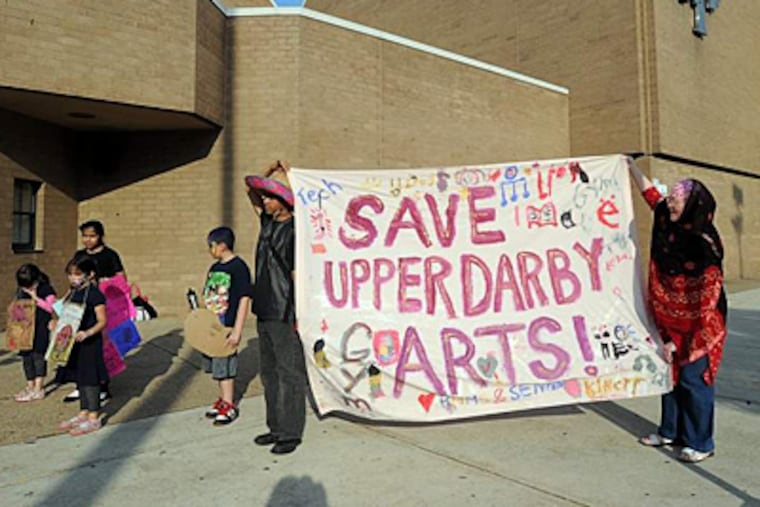 May 2012 file photo: Parents and others protest proposed cuts to arts and music programs outside Upper Darby High School before a recent school board meeting. SHARON GEKOSKI-KIMMEL / Staff Photographer