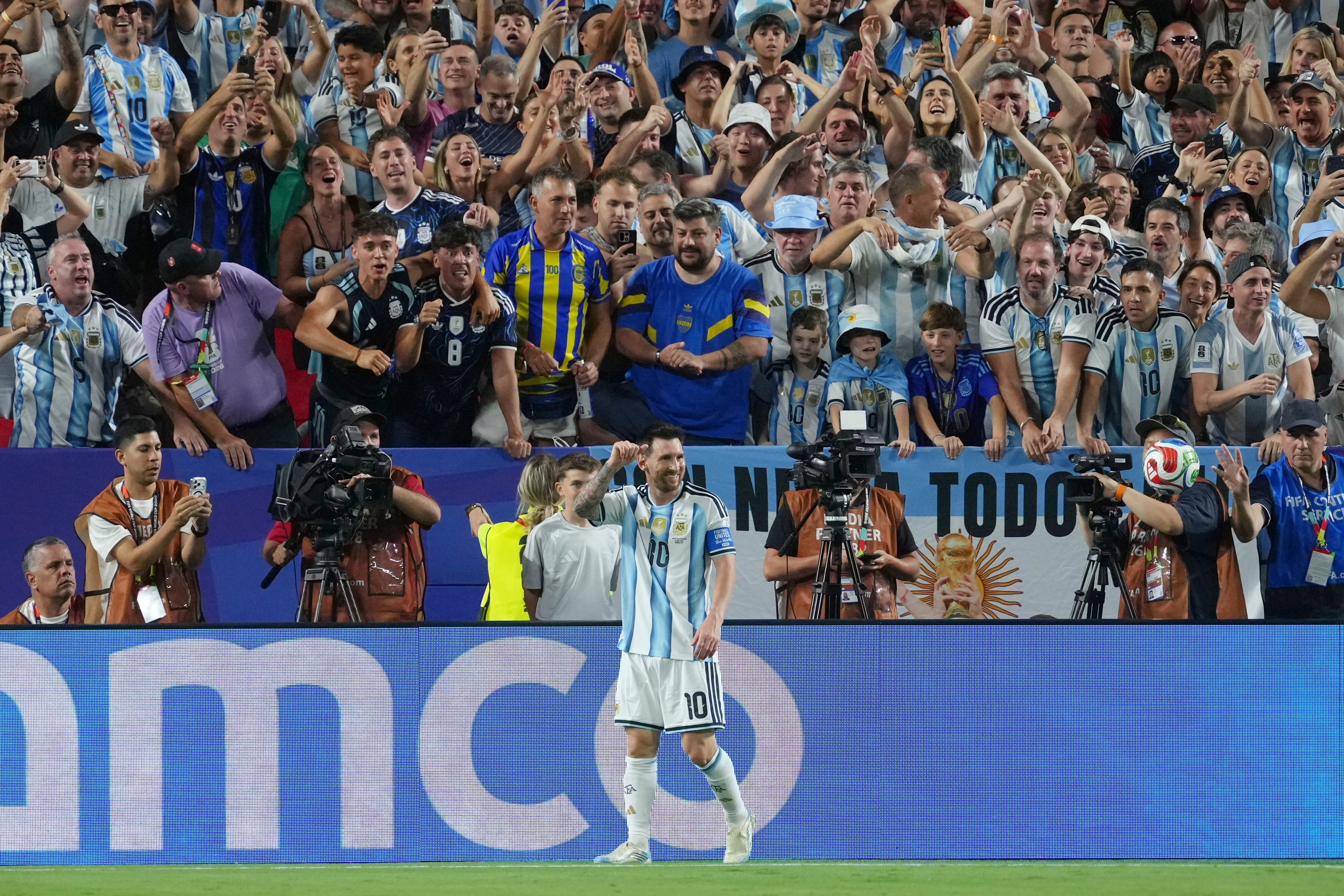 Lionel Messi ties Klose's World Cup goals record with his first hat trick as Argentina tops Algeria