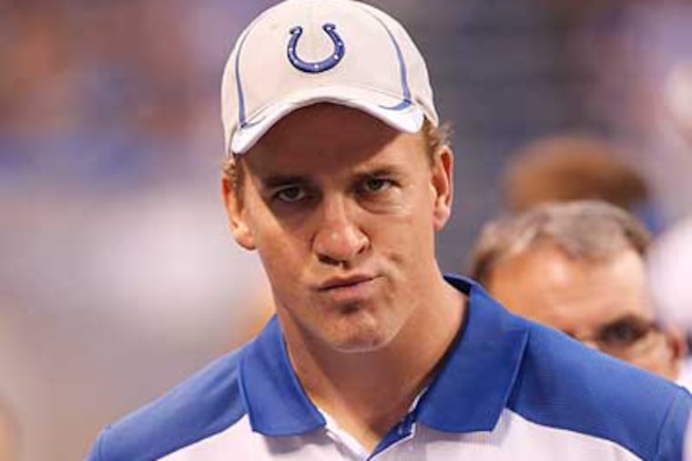 Peyton Manning and the Indianapolis Colts will part ways, according to a report. (AJ Mast/AP file photo)