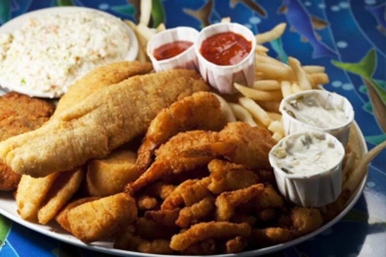 Platter of the Clam Bar's crunchy, golden-fried scallops, shrimp, flounder, clam strips, and crab cake.