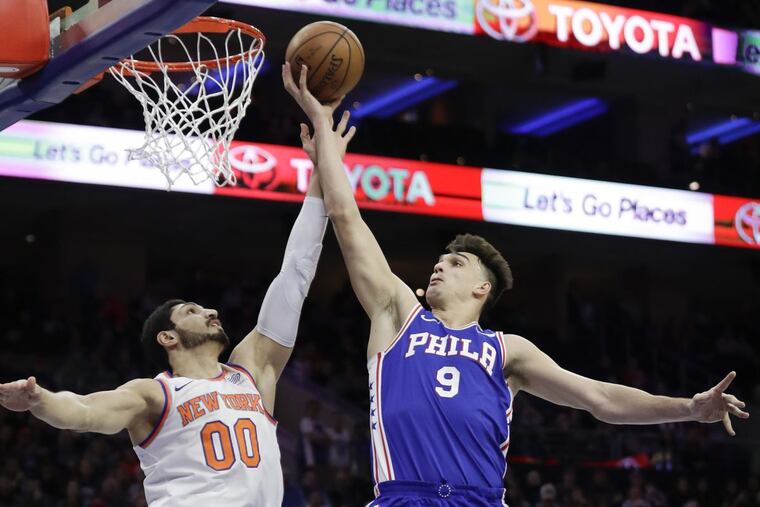 Sixers forward Dario Saric (9) has a chipped tooth and, the team hopes, nothing worse than that.