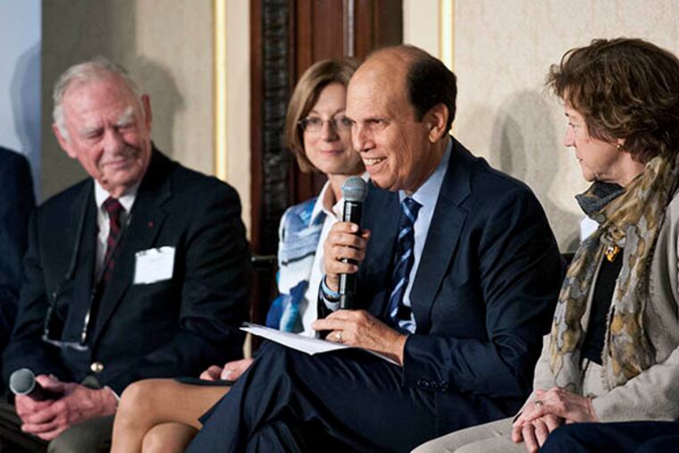 Michael Milken speaks during a panel discussion at the Prostate Cancer Foundation fundraiser at the Wanamaker Crystal Tea Room as Interstate General Media owner H.F. "Gerry" Lenfest, Janet Hass and Carole Haas Gravagno listen. ( RON TARVER / Staff Photographer )