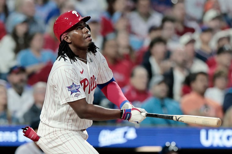 Felix Reyes hits a home run in his first major league at-bat in the second inning off Braves starter Chris Sale on Saturday.